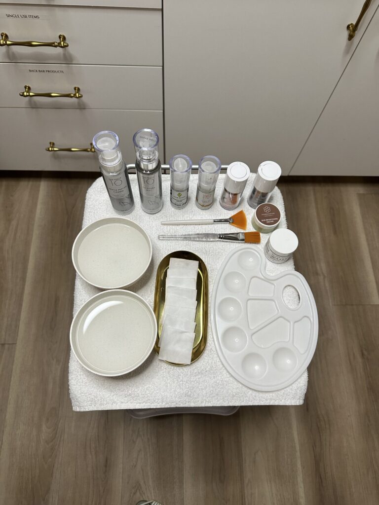 Professional facial treatment products prepared for a client