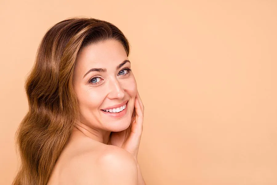 Phoenix-PRFM-Doctor Close up of a smiling woman representing healthy skin supported by collagen stimulating SELPHYL® PRFM treatments. Blessed Beauty Boutique provides SELPHYL® PRFM in Greater Phoenix.